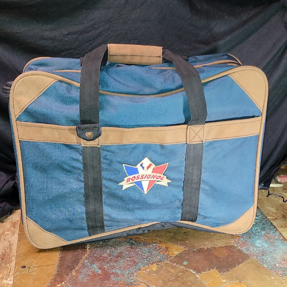 Rossignol. Vintage. Rolling Luggage Carry-on. 22l, 16w, 9 Deep. Like-new